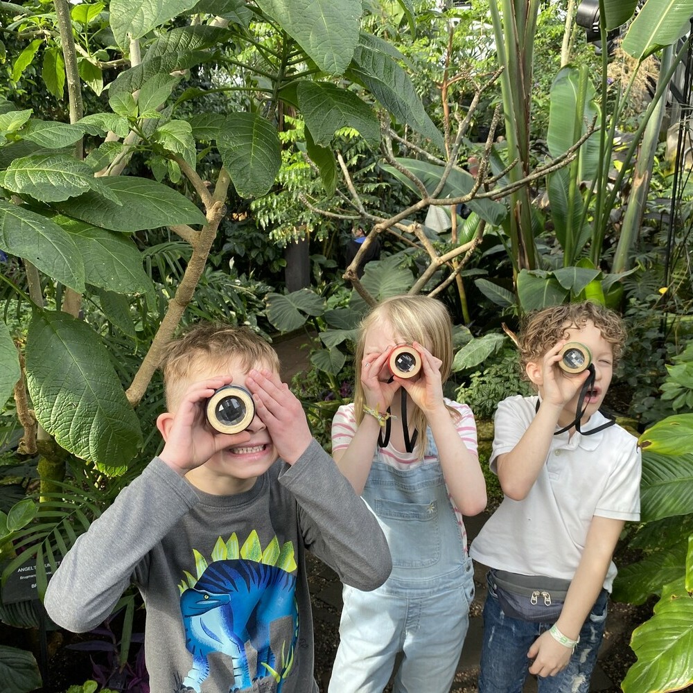 students looking through lens